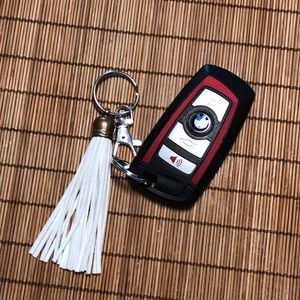 1 White or tan vegan suede tassel keychain